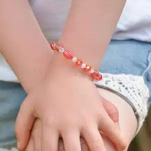 Bracelet élastique Enfant perles de verre faceté cristal et rose