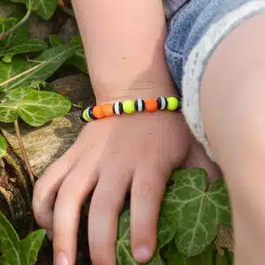 Bracelet élastique Enfant perle jaune fluo, orange fluo
