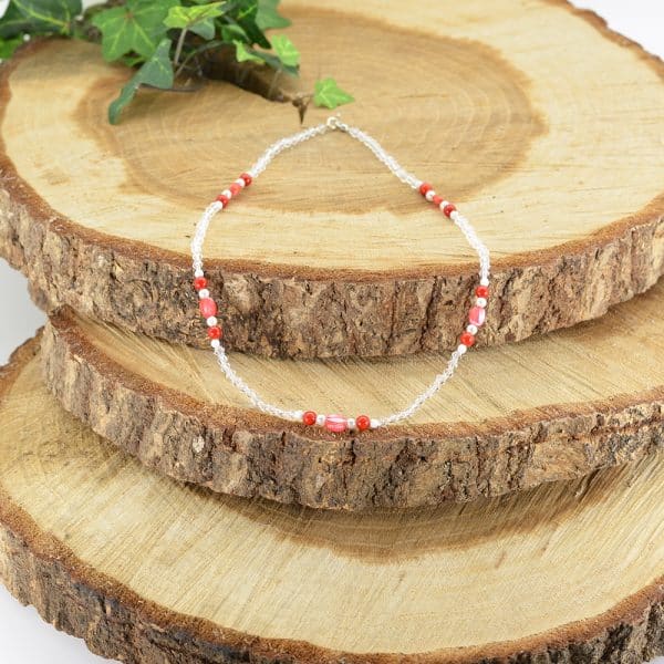 Collier différentes perles, motif disque bambou des mers