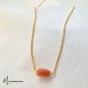 collier une perle baroque caramel sur chaine métal dorée à enfiler
