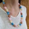 Chaine de lunettes Collier. 2 en 1 . A porter en chaine de lunettes ou en collier. Grosses perles baroques légères et élégante multicolore pastel