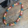 Chaine de lunettes Collier. 2 en 1 . A porter en chaine de lunettes ou en collier. Grosses perles baroques légères et élégante multicolore pastel